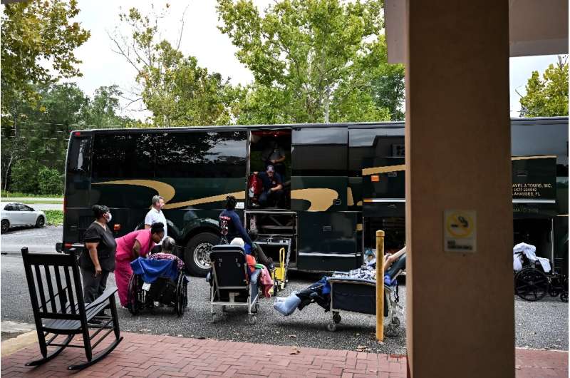 Residents of an nursing and rehabilitation facility in Crawfordville, Florida are evacuated ahead of the arrival of Hurricane Helene